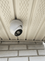 Turret camera under a soffit.